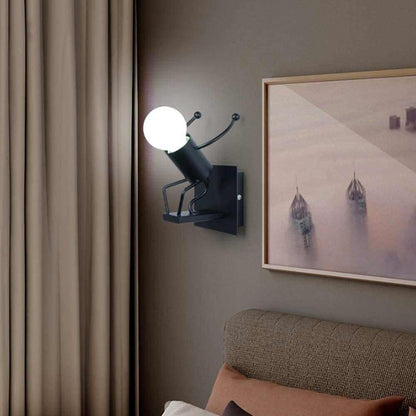 Universo - Applique da Parete Decorativo a Forma di Omino - Lampada da Muro in Metallo con Attacco E27 per Arredo Casa Soggiorno Ingresso (Omino che Salta Nero)