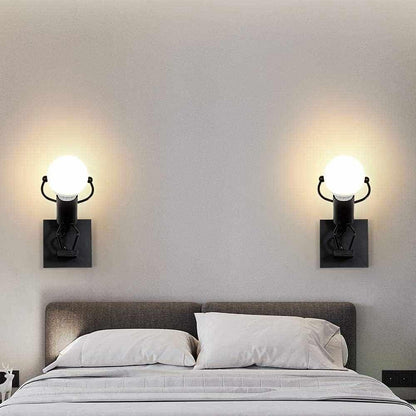Universo - Applique da Parete Decorativo a Forma di Omino - Lampada da Muro in Metallo con Attacco E27 per Arredo Casa Soggiorno Ingresso (Omino che Salta Nero)