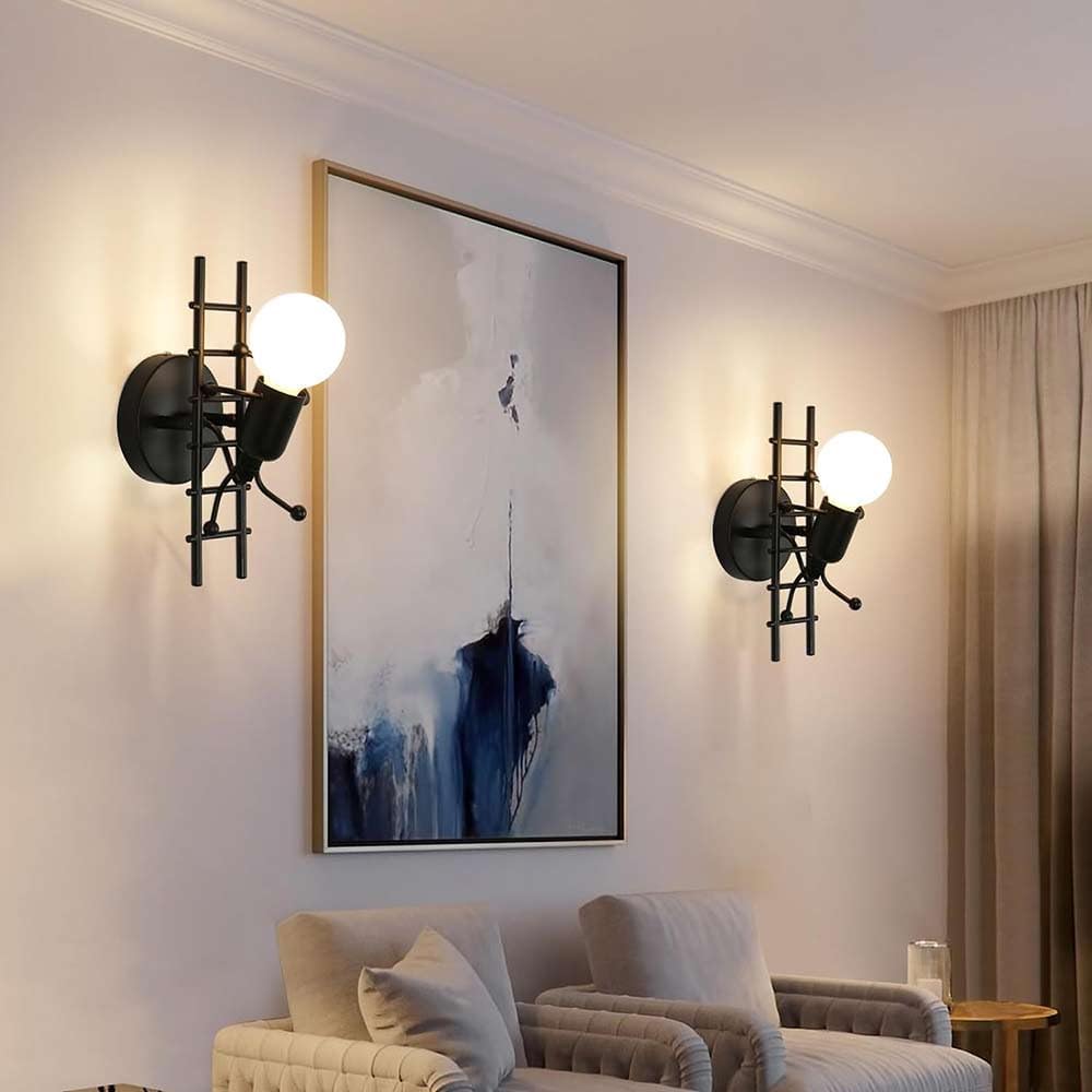 Universo - Applique da Parete Decorativo a Forma di Omino - Lampada da Muro in Metallo con Attacco E27 per Arredo Casa Soggiorno Ingresso (Omino sulla Scala Nero)